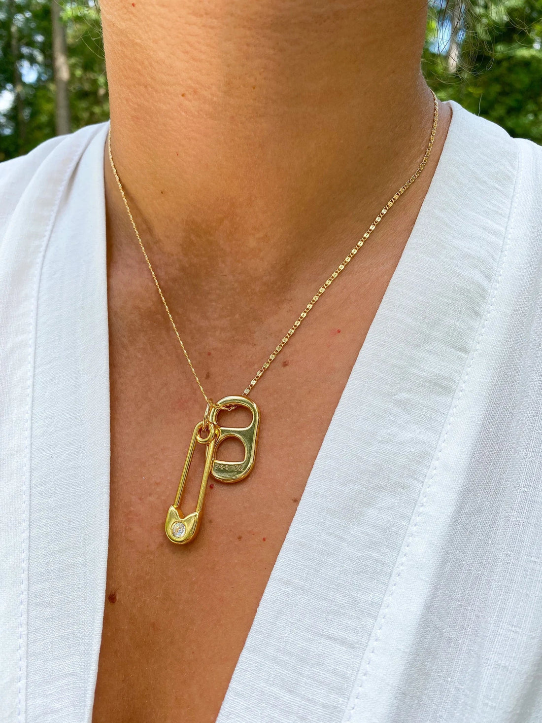 🪙 Can Necklace Meaning: Symbolism, Trend & TikTok Buzz