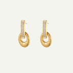 Gold hoop earrings with embedded stones on a white background